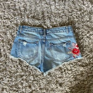 Embroidered mid waisted jean shorts